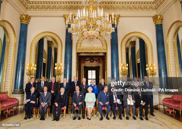 Queen Elizabeth II with members of the Order of Merit Professor Sir Roger Penrose, Lord Foster of Thames Bank, the Revd. Professor Owen Chadwick, the...