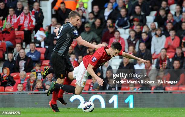 Manchester United's Tyler Blackett is fouled by Liverpool's Jon Flanagan for his teams second penalty, during the Barclays Under-21 Premier League,...