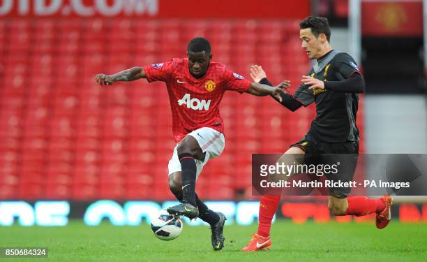 Manchester United's Larnell Cole battles for the ball with Liverpool's Krisztian Adorjan during the Barclays Under-21 Premier League, Semi Final at...
