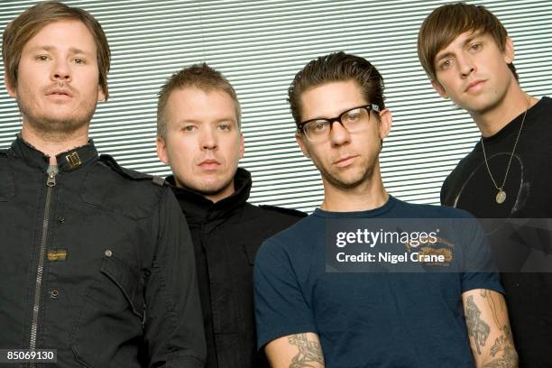 Photo of ANGELS & AIRWAVES; Posed group portrait - Tom DeLonge, Matt Wachter, Adam 'Atom' Willard and David Kennedy