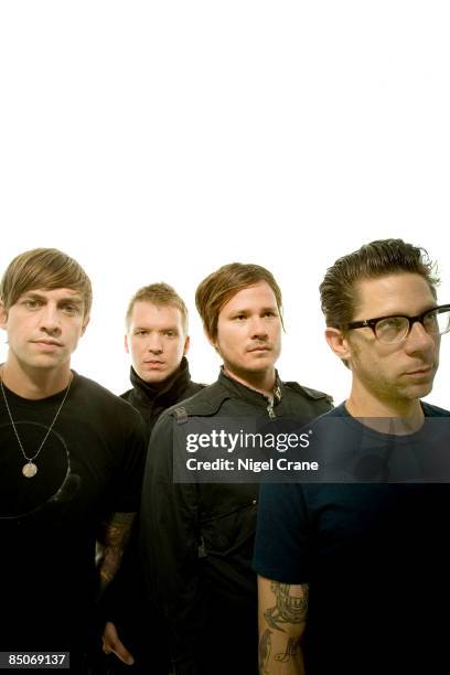 Photo of ANGELS & AIRWAVES; Posed group portrait - David Kennedy, Matt Wachter, Tom DeLonge and Adam 'Atom' Willard