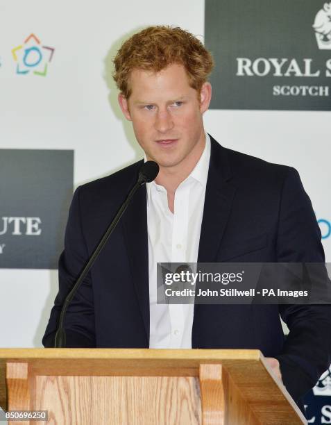 Prince Harry speaks at the Greenwich Polo Club, Connecticut, USA, prior to the Sentebale Royal Salute Polo Cup, as part of his tour of the USA.