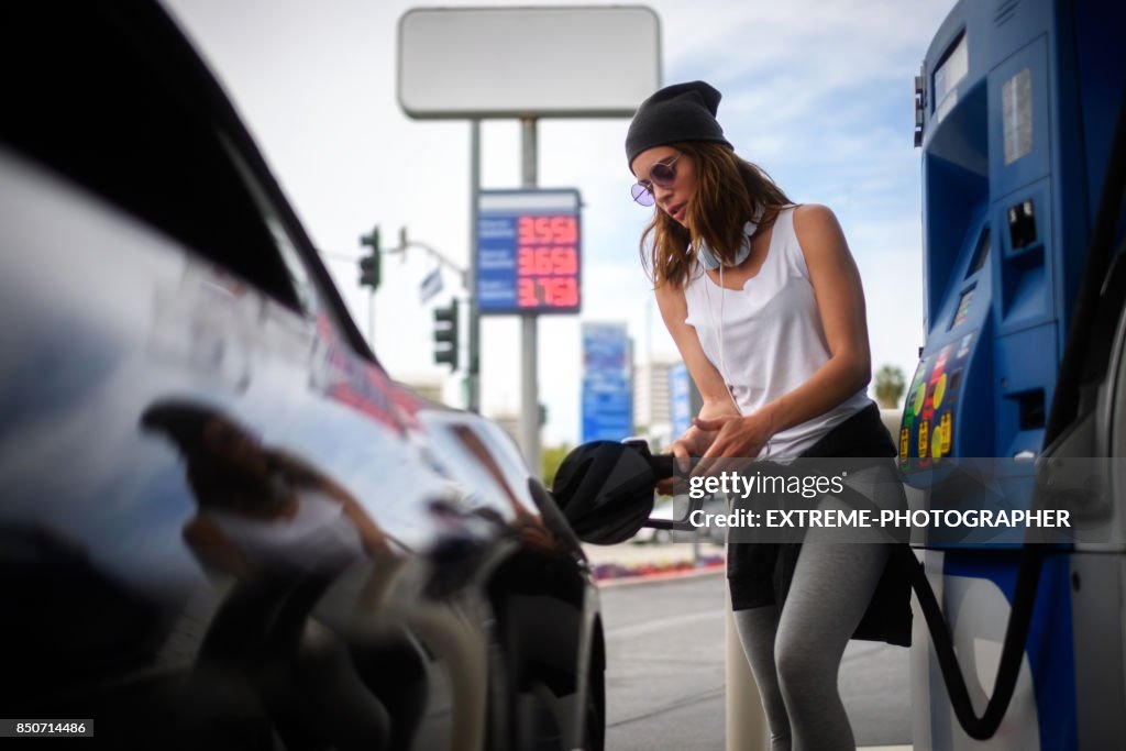 Woman at the gas station