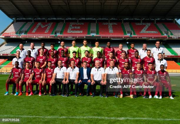 France's Ligue 1 football club FC Metz' doctor Eric Sitte, doctor Andre Marie, French forward Opa Nguette, Argentinian midfielder Geronimo Poblete,...