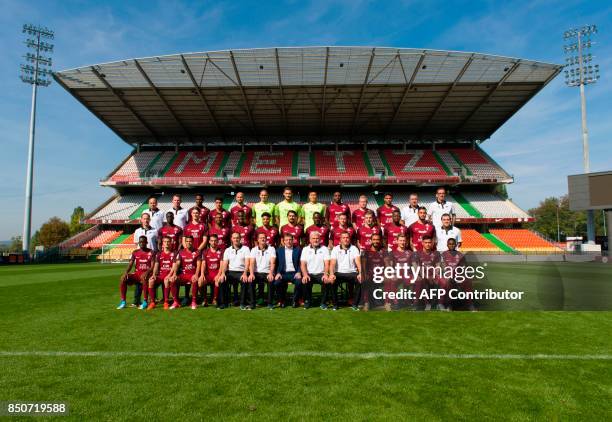 France's Ligue 1 football club FC Metz' doctor Eric Sitte, doctor Andre Marie, French forward Opa Nguette, Argentinian midfielder Geronimo Poblete,...