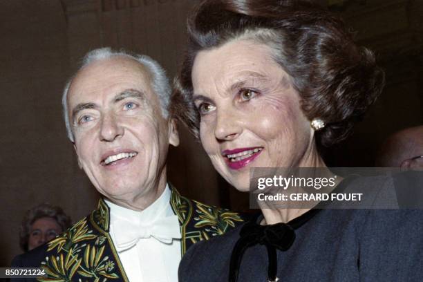 French Senator Andre Bettencourt poses next to his wife Liliane Bettencourt, French business woman and l'Oreal's chief shareholder after his...