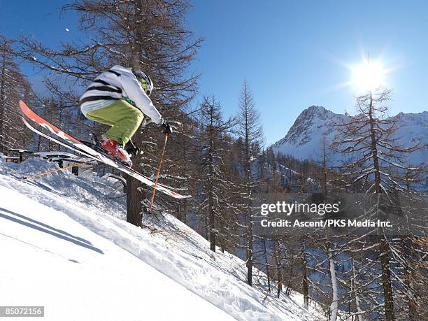 teenage boy in mid-sir ski descent, in forest - bardonecchia fotografías e imágenes de stock