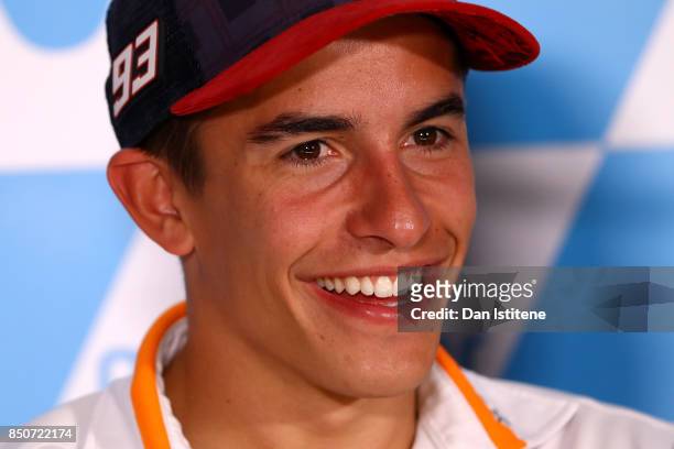 Marc Marquez of Spain and the Repsol Honda Team smiles during a press conference during previews for the MotoGP of Aragon at Motorland Aragon Circuit...