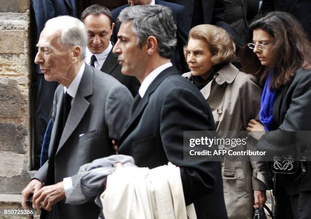 Picture taken on July 6 shows French business man Andre Bettencourt , his wife Liliane , his butler Pascal Bonnefoy , and their daughter Francoise...