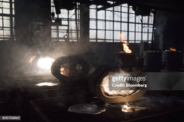 Smoke rises from molten magnesium as it cools at the Lite Metals Co. Foundry in Ravenna, Ohio, U.S., on Wednesday, Sept. 20, 2017. The Lite Metals...