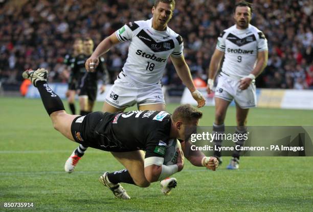 Huddersfield's Larne Patrick scores a try during the Super League match at the Stobart Stadium Halton, Widnes. PRESS ASSOCATION Photo. Picture date:...