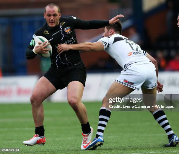 Widnes Viking's Dave Allen and Huddersfield's Dale Ferguson during the Super League match at the Stobart Stadium Halton, Widnes. PRESS ASSOCATION...