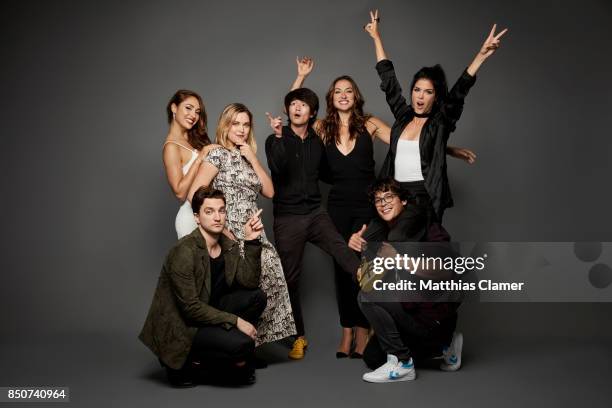 Actors Lindsey Morgan, Richard Harmon, Eliza Taylor, Christopher Larkin, Tasya Teles, Bob Morley and Marie Avgeropoulos from The 100 are photographed...