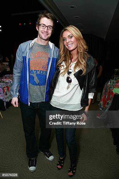 Actor Robert Buckley and actress Jasmine Dustin pose at the Golden Globe Gift Suite Presented by GBK Productions on January 9, 2009 in Beverly Hills,...