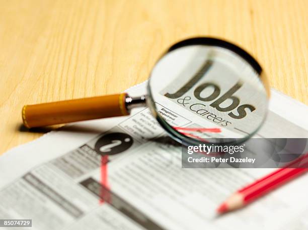 new paper jobs and careers page. - downsizing unemployment stock pictures, royalty-free photos & images
