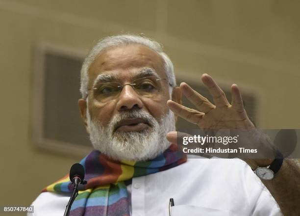 Prime Minister Narendra Modi addresses the gathering at Sahkar Sammelan, on the occasion of birth centenary of Laxmanrao Inamdar on September 21,...