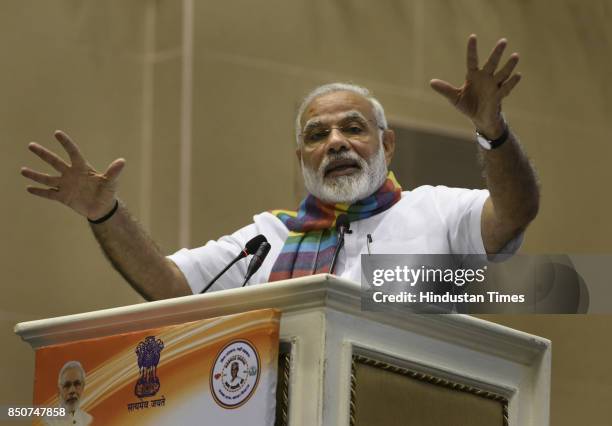 Prime Minister Narendra Modi addresses the gathering at Sahkar Sammelan, on the occasion of birth centenary of Laxmanrao Inamdar on September 21,...