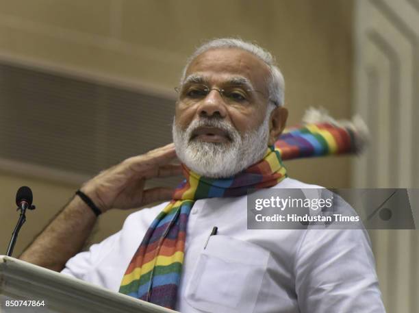 Prime Minister Narendra Modi addresses the gathering at Sahkar Sammelan, on the occasion of birth centenary of Laxmanrao Inamdar on September 21,...