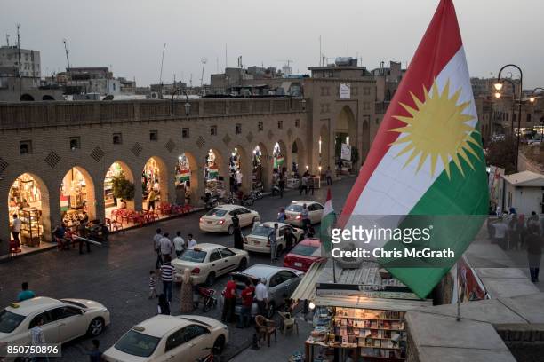 The Kurdish Regional Government flag is seen on a street in the old city ahead of the upcoming referendum for independence of Kurdistan on September...