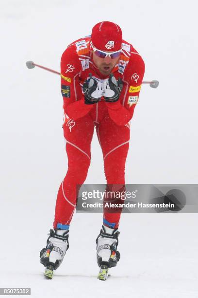 Andrew Newell of USA competes during the Men's Cross Country Sprint Qualification race at the FIS Nordic World Ski Championships 2009 on February 24,...