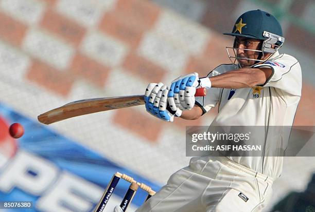 Pakistani cricketer Younus Khan plays a shot during the fifth and final day of the first Test match between Pakistan and Sri Lanka at The National...