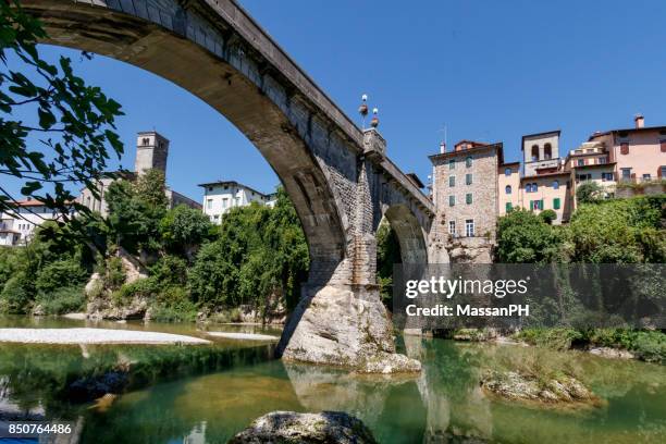 the devil's bridge seen from the bed of natisone - veneto stock pictures, royalty-free photos & images