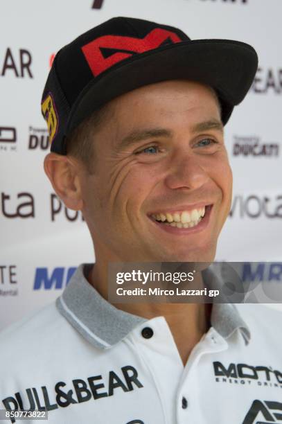 Alvaro Bautista of Spain and Pull&Bear Aspar Team smiles in paddock during the MotoGP of Aragon - Previews at Motorland Aragon Circuit on September...