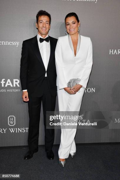 Alena Seredova and Alessandro Nasi walk the red carpet of amfAR Gala Milano on September 21, 2017 in Milan, Italy.