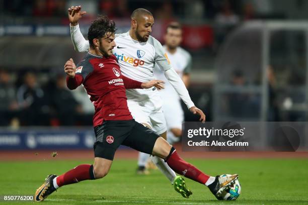 Sidney Sam of Bochum is challenged by Tim Leibold of Nuernberg during the Second Bundesliga match between 1. FC Nuernberg and VfL Bochum 1848 at...