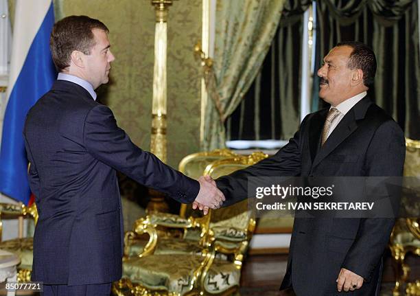 Russian President Dmitry Medvedev greets Yemeni President Ali Abdullah Saleh during their meeting at the Kremlin in Moscow on February 25, 2009....