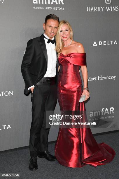 Federica Panicucci and Marco Bacini walk the red carpet of amfAR Gala Milano on September 21, 2017 in Milan, Italy.