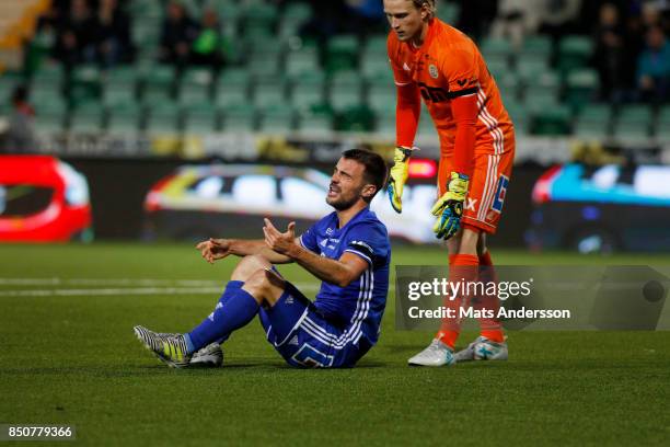 Carlos Moros Gracia and William Eskelinen, goalkeeper of GIF Sundsvall during the Allsvenskan match between GIF Sundsvall and AIK at Norrporten Arena...