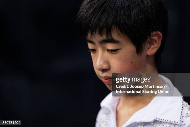 Tatsuya Tsuboi of Japan looks on in the Junior Men's Short Program during day one of the ISU Junior Grand Prix of Figure Skating at Minsk Arena on...