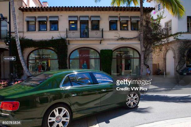 Green Bentley turn onto Worth Avenue. Worth Avenue, in Palm Beach, is one of the premier upscale shopping streets in the world. Distinguishing Worth...