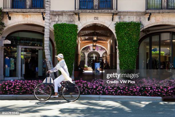 Biking in Worth Avenue pass Via Amore. Worth Avenue, in Palm Beach, is one of the premier upscale shopping streets in the world. Distinguishing Worth...