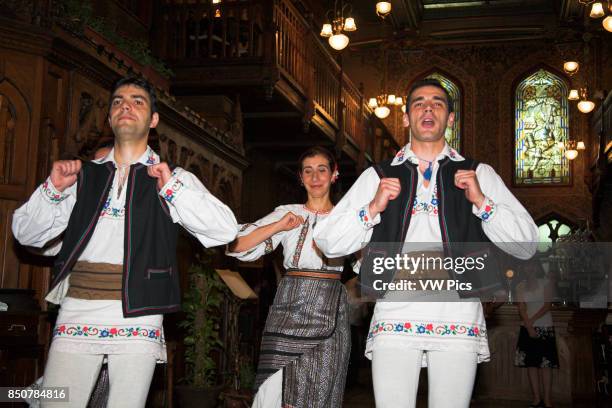 Dancers in national costume, Caru cu Bere Restaurant, Str Stavropoleos, Bucharest, Romania.