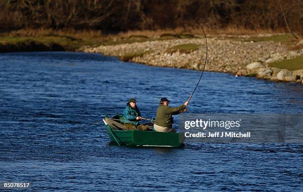 Fisherman casts on the lower Crathes beat on The River Dee on February 25, 2009 in Banchory, Scotland. Internationally renowned for its salmon...