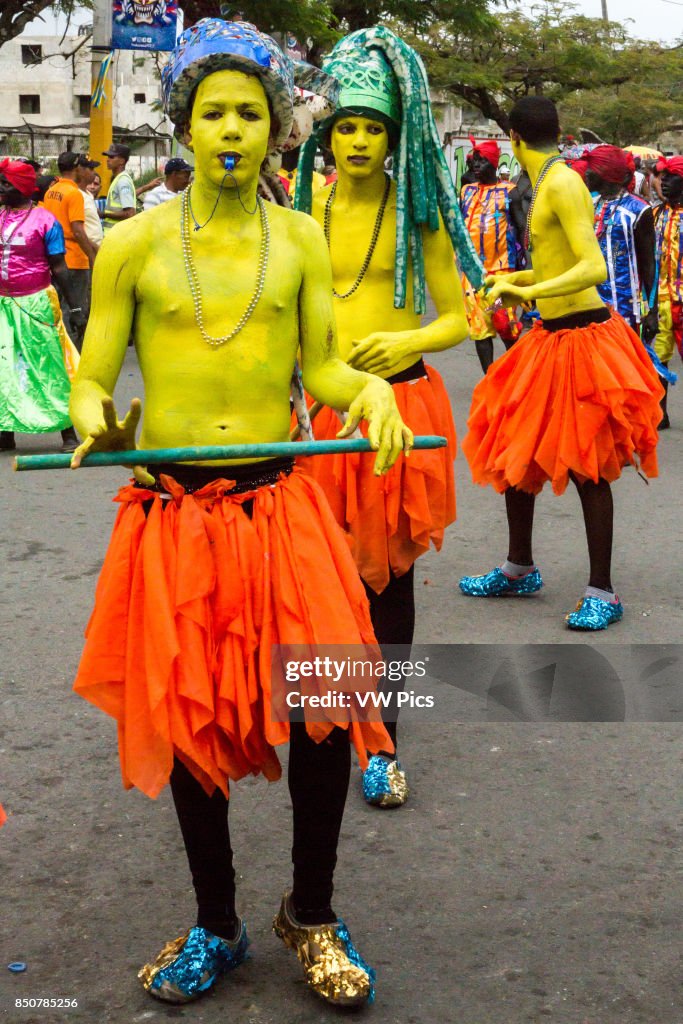 Young man in body paint as a tribal warrior in the La Vega Carnival parade. Dominican Republic.