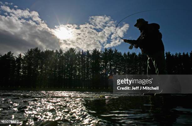 Robert Harper, the head Ghillie , casts his fly on the lower Crathes beat of The River Dee, cast a line on February 25, 2009 in Banchory, Scotland....