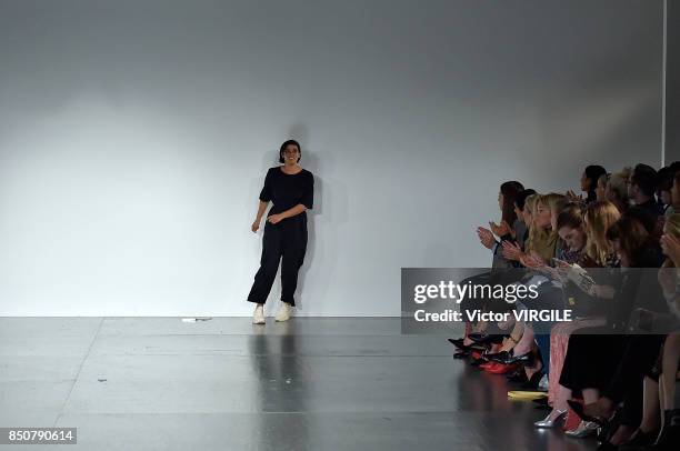 Fashion designer Faustine Steinmetz walks the runway at the Faustine Steinmentz Ready to Wear Spring/Summer 2018 fashion show during London Fashion...
