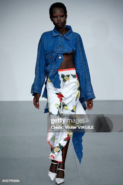 Model walks the runway at the Faustine Steinmentz Ready to Wear Spring/Summer 2018 fashion show during London Fashion Week September 2017 on...