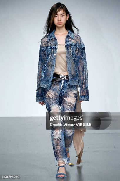 Model walks the runway at the Faustine Steinmentz Ready to Wear Spring/Summer 2018 fashion show during London Fashion Week September 2017 on...