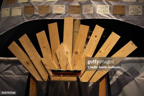 Notes are displayed on a sail of "Ghost Ship" art installation at the Oakland Museum of California on September 21, 2017 in Oakland, California....