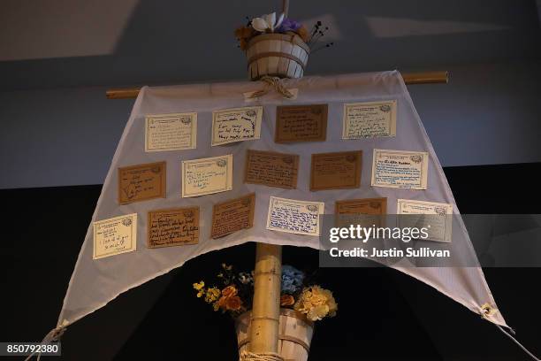 Notes are displayed on a sail of "Ghost Ship" art installation at the Oakland Museum of California on September 21, 2017 in Oakland, California....