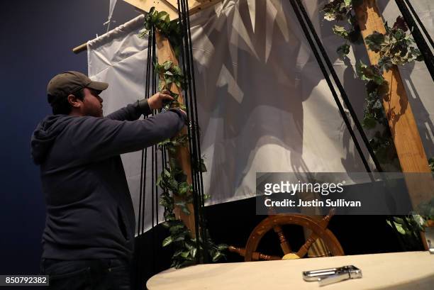 Artist Chris Treggiari works on his "Ghost Ship" art installation at the Oakland Museum of California on September 21, 2017 in Oakland, California....