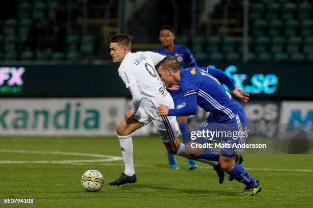 Rasmus Lindkvist of AIK and Sebastian Rajalakso of GIF Sundsvall during the Allsvenskan match between GIF Sundsvall and AIK at Norrporten Arena on...