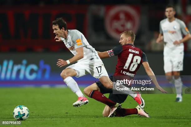 Robbie Kruse of Bochum eludes Hanno Behrens of Nuernberg during the Second Bundesliga match between 1. FC Nuernberg and VfL Bochum 1848 at...