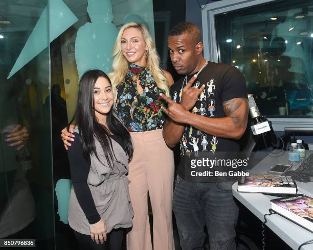 Nicole Adamo and professional wrestler Charlotte Flair visit 'The Whoolywood Shuffle' hosted by DJ Whoo Kid on SiriusXM's Shade 45 at SiriusXM...