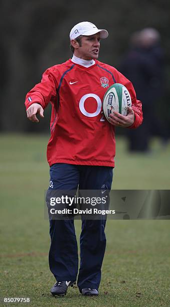 Brian Smith, the England attack coach holds the ball during the England training session held at the Pennyhill Park Hotel on February 25, 2009 in...