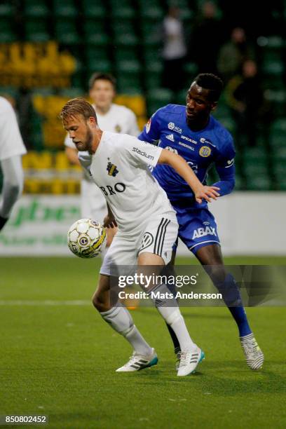 Daniel Sundgren of AIK and Peter Wilson of GIF Sundsvall during the Allsvenskan match between GIF Sundsvall and AIK at Norrporten Arena on September...